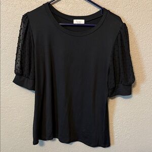Elegant Black Blouse with Textured Sleeves